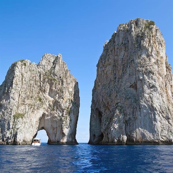 FOTOMURALE ADESIVO IN TNT MIS.100x100 cm I FARAGLIONI DI CAPRI